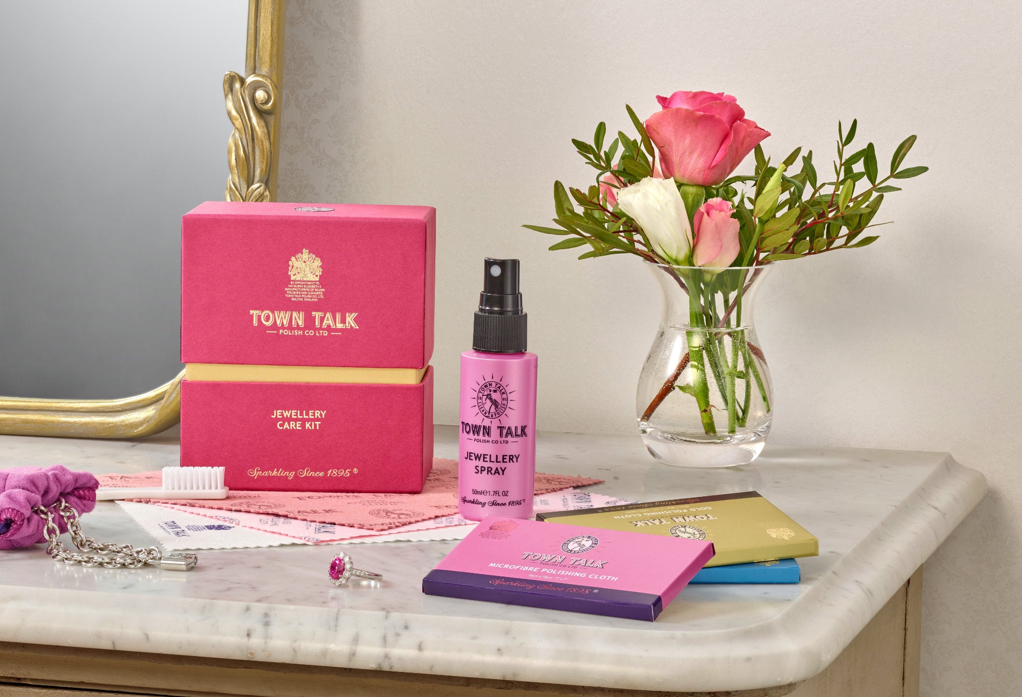 Town Talk Jewellery Care Collection including Jewellery Care Kit, Jewellery Spray and Microfibre Polishing Cloth on Marble Surface